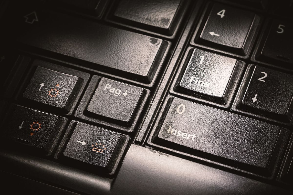 Dirty Black Keyboard Buttons (46078957165).jpg